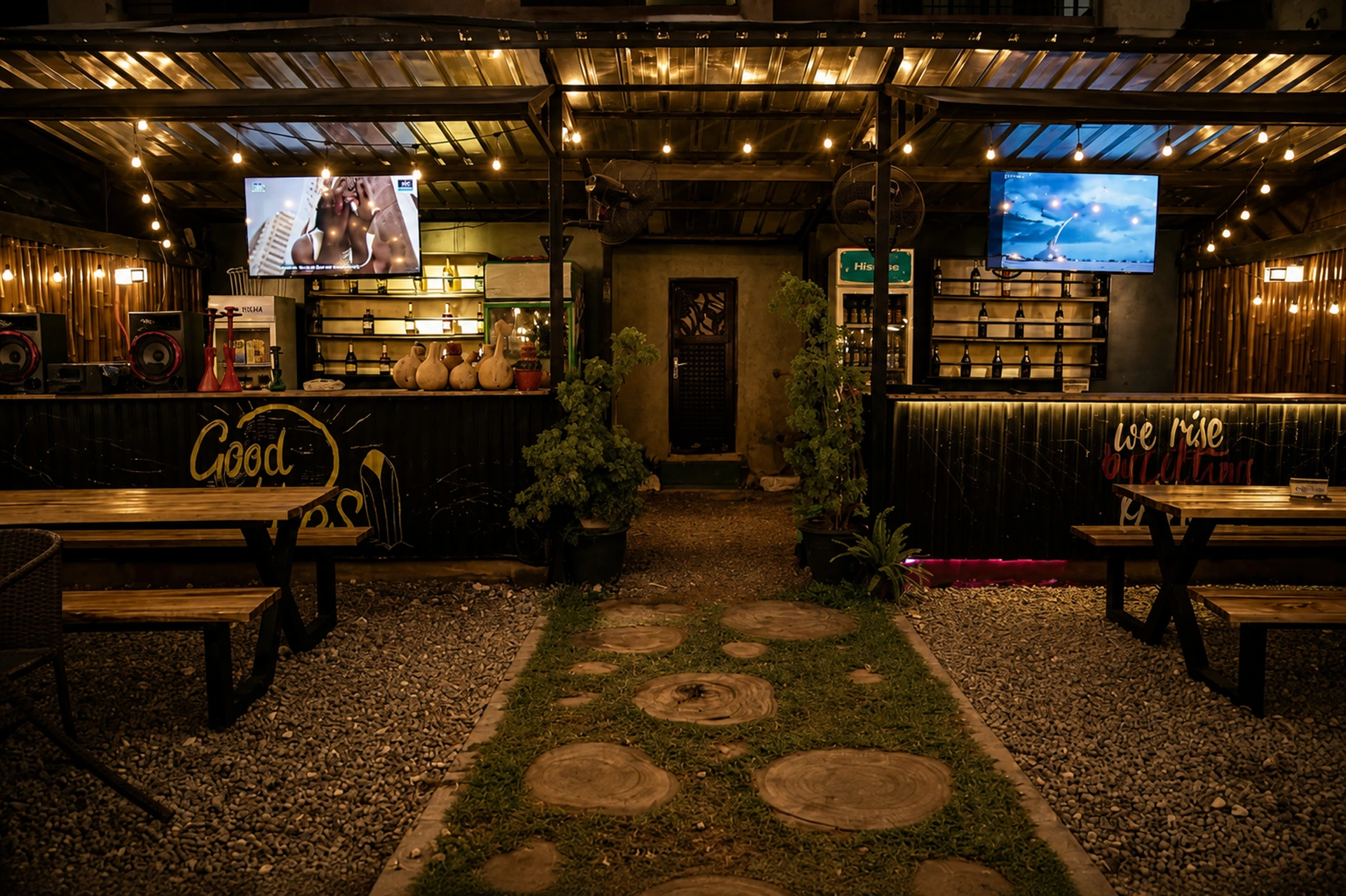 IROKO outdoor lounge under evening lights